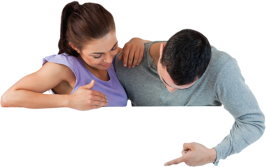 Young couple looking at wall below them