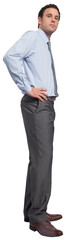 Serious businessman with hand on hip