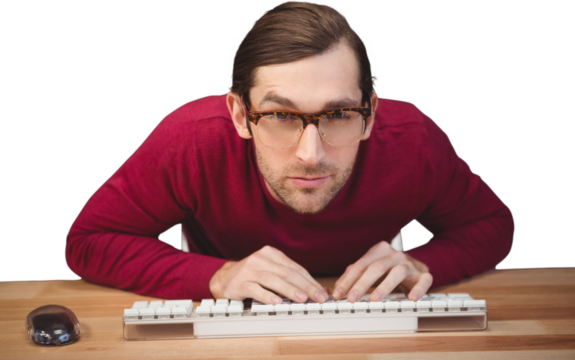 Portrait of concentrated man working on computer
