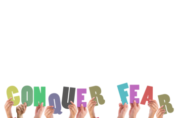 Cropped hands holding colorful words conquer fear 