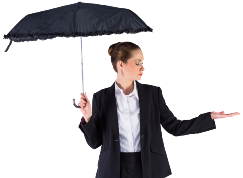 Businesswoman holding a black umbrella