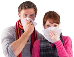 Couple blowing noses into tissues