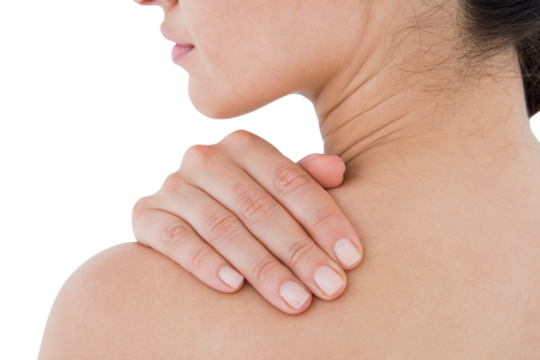 Brunette touching her painful shoulder