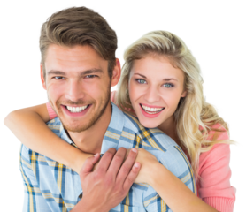 Attractive couple embracing and smiling at camera