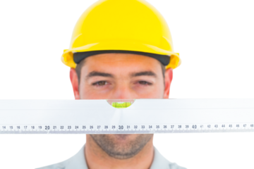 Handyman looking at spirit level