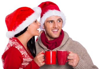 Young festive couple holding mugs