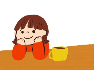 コーヒーを飲みながらのんびりしている女の子