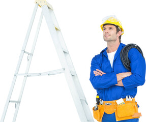 Thoughtful electrician with arms crossed by ladder