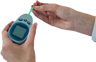 Close up of man hand testing blood sugar with glucometer