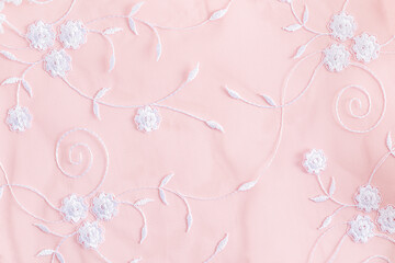 pastel background with white embroidered colors. delicate background texture. festive , wedding background. cloth.