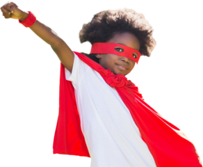 Portrait of boy in red cape and eye mask