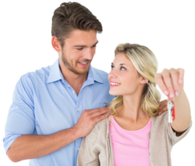 Attractive young couple showing new house key