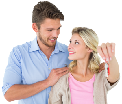 Attractive young couple showing new house key