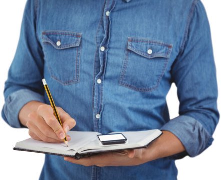 Mid section of hipster with mobile phone writing on book - Powered by Adobe