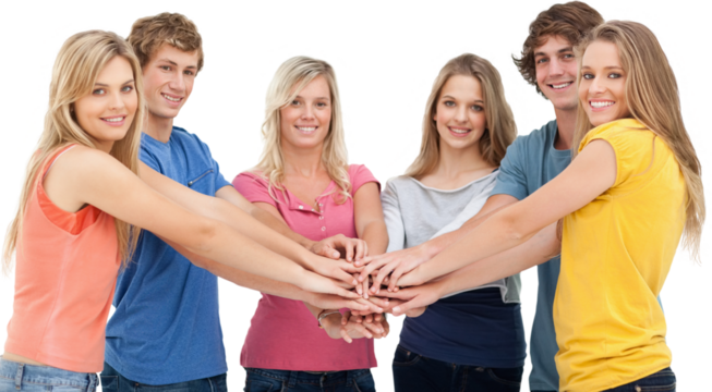 Friends standing around each other as they stack their hands