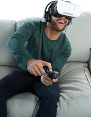Man playing video game with virtual reality headset