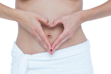 Attractive woman touching her belly 