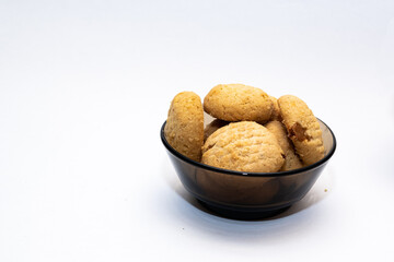 A small bowl full of plain Kahk with no sugar (traditional Arabian cookies), celebration feast after Ramadan, holy month
