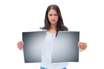 Woman holding a broken placard