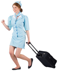 Pretty air hostess pulling suitcase