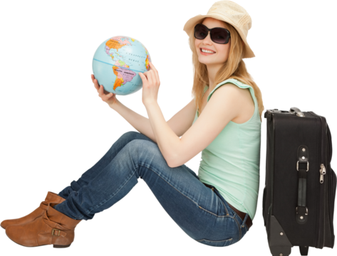 Portrait of woman with globe while sitting by luggage