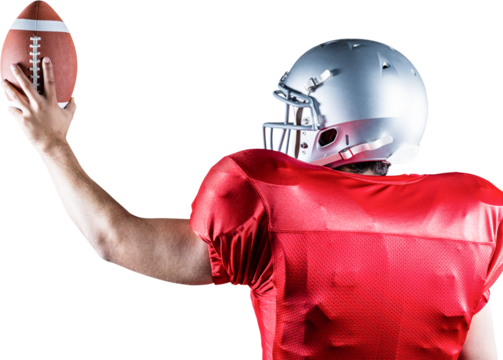 Rear view of American football player holding ball - Powered by Adobe