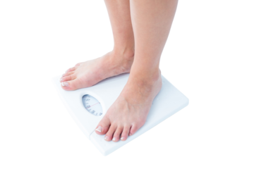 Woman standing on the scales