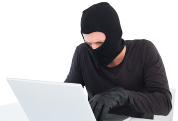 Hacker using laptop to steal identity