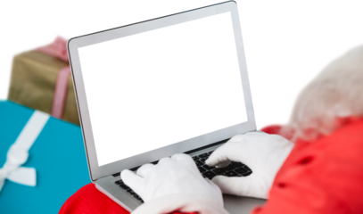 Close-up of Santa Claus using laptop against white background