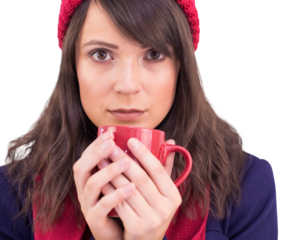 Serious young woman holding a mug