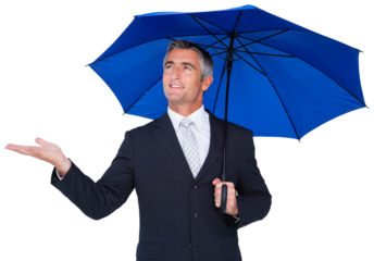 Businessman holding blue umbrella with hand out