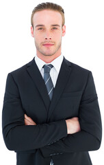 Frowning businessman looking at camera