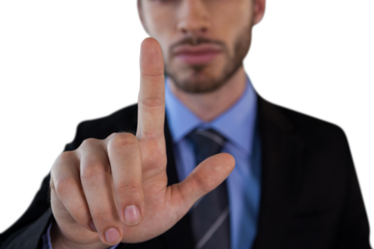 Mid section of mid adult businessman touching on invisible interface