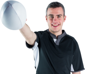 Portrait of smiling rugby player holding ball