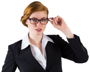 Redhead businesswoman touching her glasses