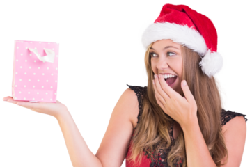 Festive blonde holding a gift bag