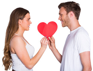 Romantic young couple holding heart