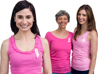 Portrait of smiling women in pink outfits posing for breast cancer awareness
