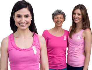 Portrait of smiling women in pink outfits posing for breast cancer awareness