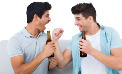 Sports fans cheering while holding beer