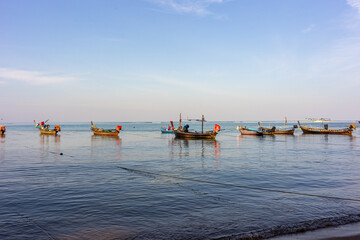 Fototapeta na wymiar Fish Boats by the Beach
