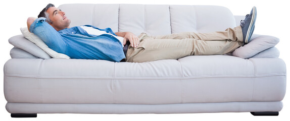 Side view of man resting on sofa