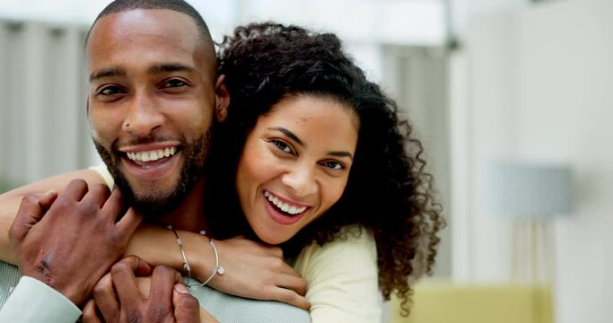 Portrait, love and a couple hugging in their home while bonding together in the living room for romance. Smile, happy or dating with an affectionate boyfriend and girlfriend embracing in their house