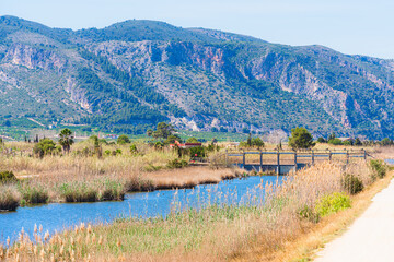 Fototapeta na wymiar View of the Cow River with mountains in the background, Xeraco, Region of Valencia, Spain