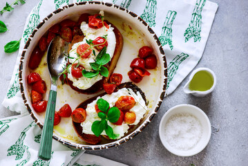 Bruschetta with buratta and baked cherry tomatoes.selective focus