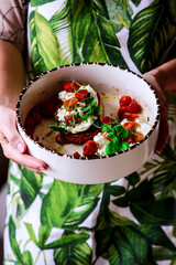 Bruschetta with buratta and baked cherry tomatoes.selective focus