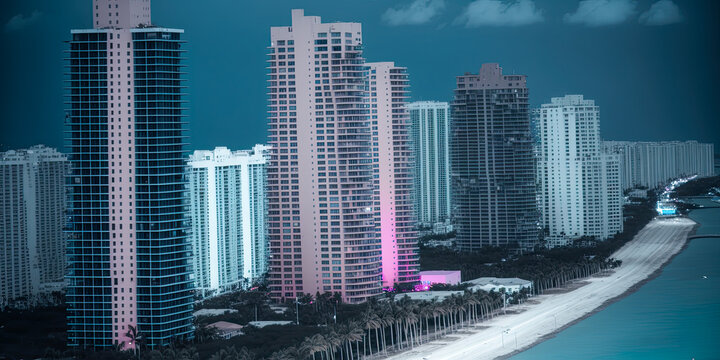 Miami Beach skyscrapers at night - Generative AI