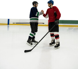 Obraz premium Ice hockey players shaking hands at rink