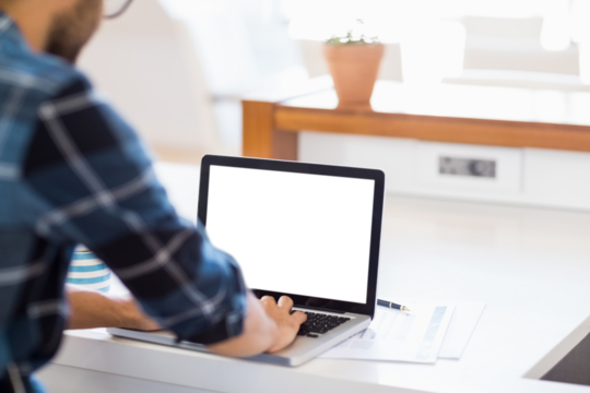 Cropped image of businessman using laptop