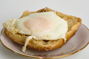 egg over toast isolated on white